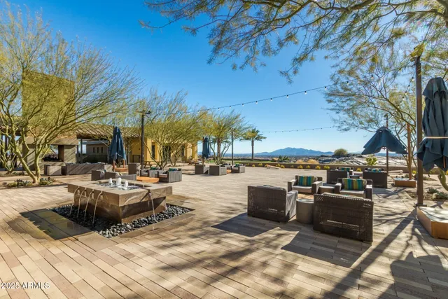 a view of a patio with swimming pool