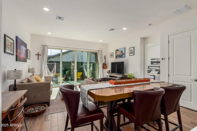 a view of a dining room with furniture window and outside view