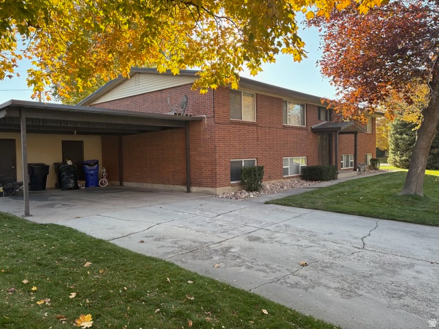 281 West 650 South Bountiful, UT 84010 - Photo 3 of 9 View of carports with attached storage units and long driveways for additional parking