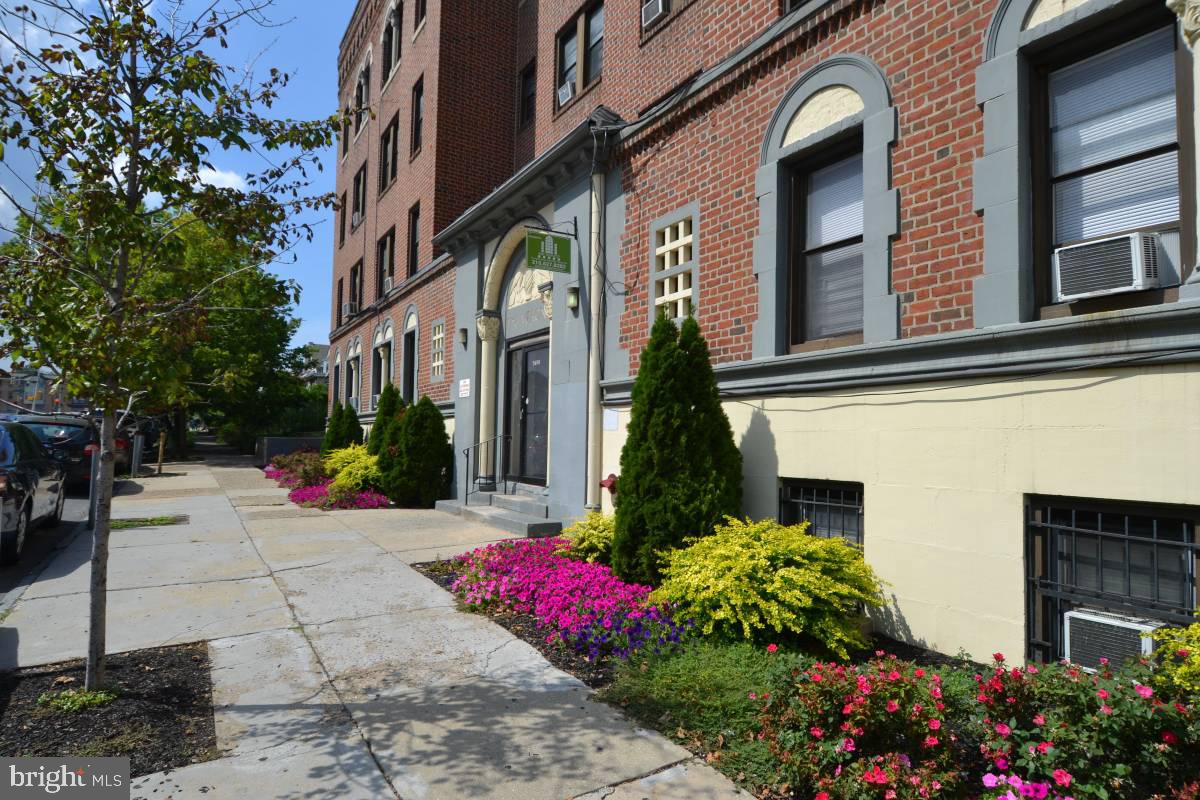 a front view of a multi story residential apartment building
