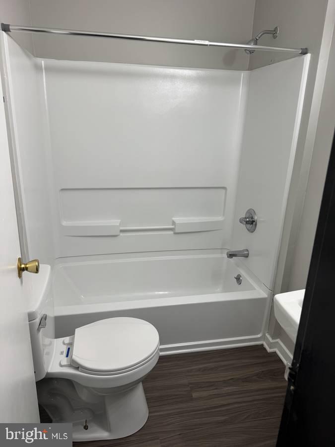4715 Walnut Street, Unit 101 Philadelphia, PA 19139 - Photo 4 of 5 a bathroom with a toilet and a shower