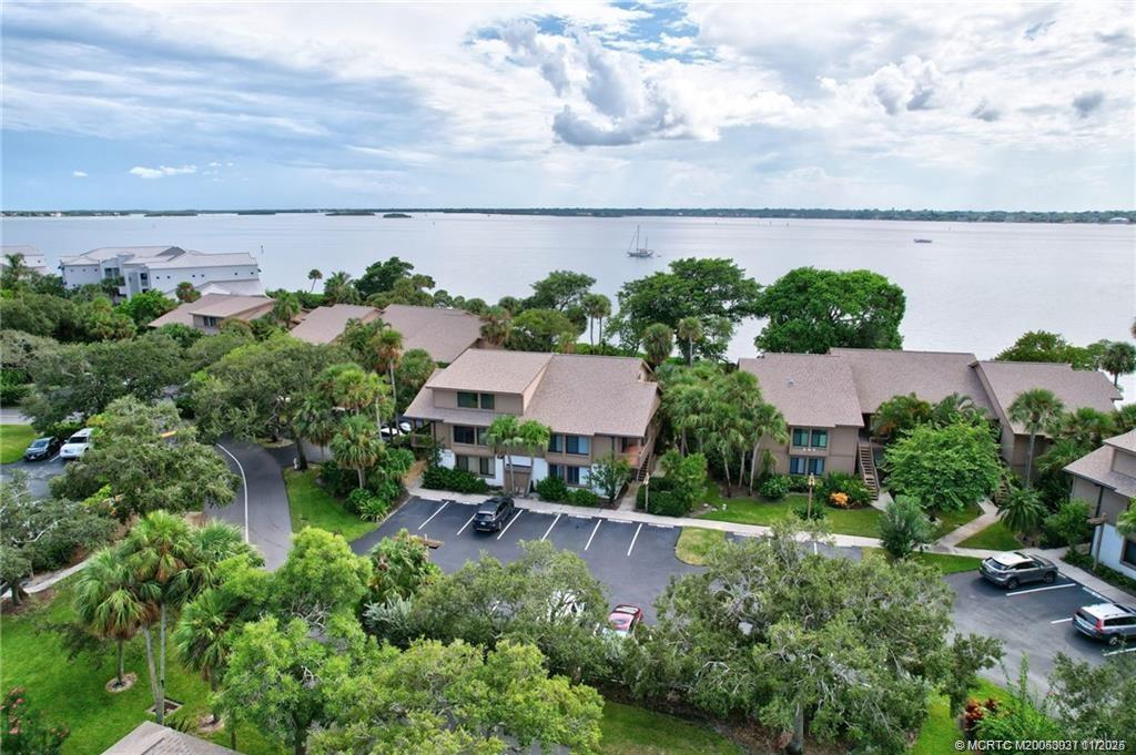 248 Northeast Edgewater Drive Stuart, FL 34996 - Photo 38 of 38 an aerial view of a house with garden space and street view