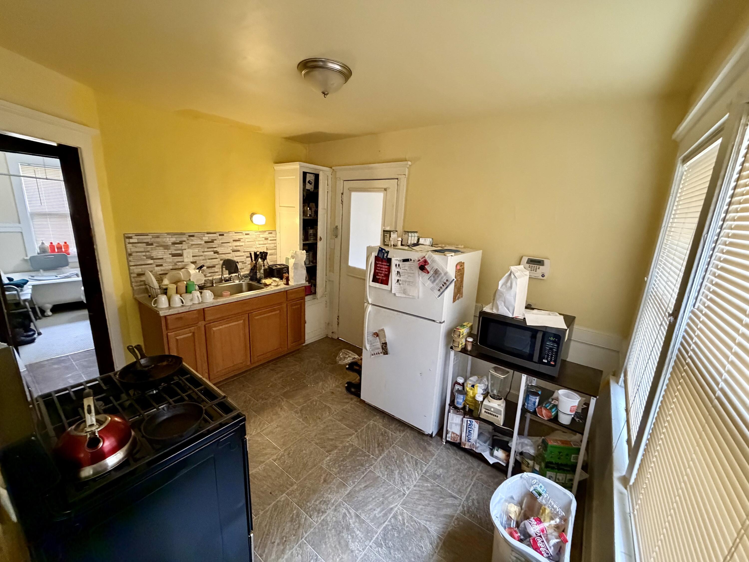 2106 North 42nd Street, Unit 2108 Milwaukee, WI 53208 - Photo 5 of 10 Lower Kitchen