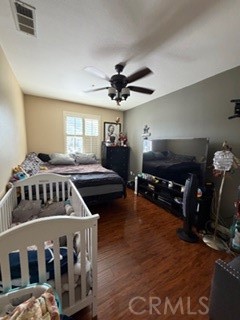 17416 Birchtree Street Fontana, CA 92337 - Photo 11 of 18 a living room with furniture a fireplace and a window