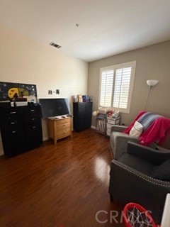 17416 Birchtree Street Fontana, CA 92337 - Photo 13 of 18 a living room with furniture and a window
