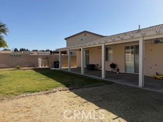 17416 Birchtree Street Fontana, CA 92337 - Photo 17 of 18 a view of a house with a yard