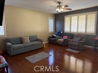 17416 Birchtree Street Fontana, CA 92337 - Photo 3 of 18 a living room with furniture and a large window