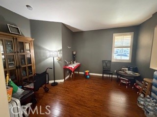 17416 Birchtree Street Fontana, CA 92337 - Photo 6 of 18 a living room with furniture and a wooden floor
