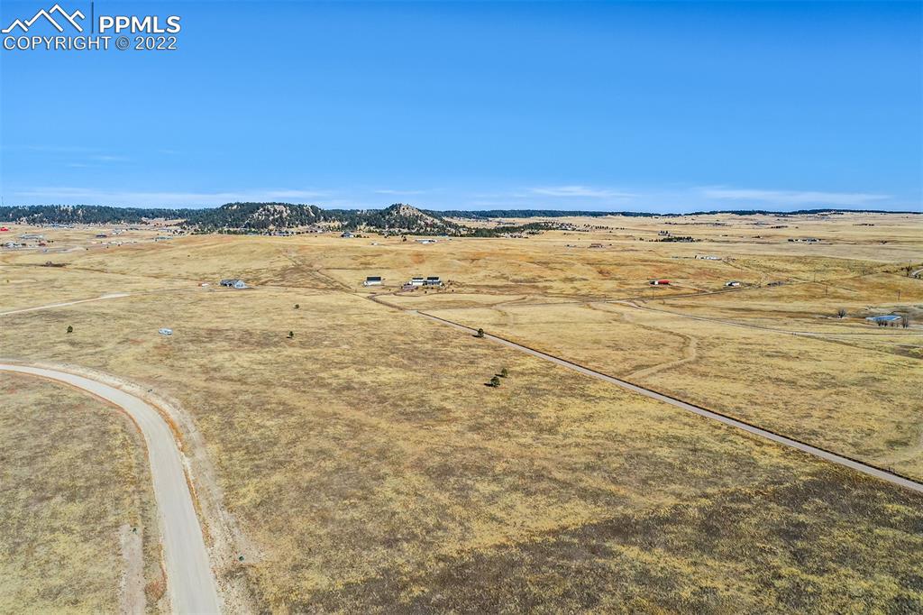 14860 Tiboria Loop Peyton, CO 80831 - Photo 18 of 33 a view of an ocean and beach