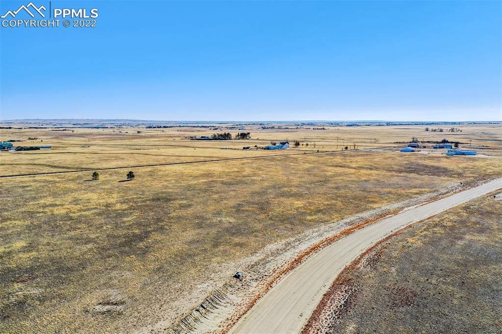 14860 Tiboria Loop Peyton, CO 80831 - Photo 23 of 33 a view of an ocean and beach
