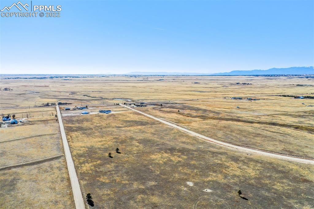 14860 Tiboria Loop Peyton, CO 80831 - Photo 9 of 33 a view of an ocean and beach