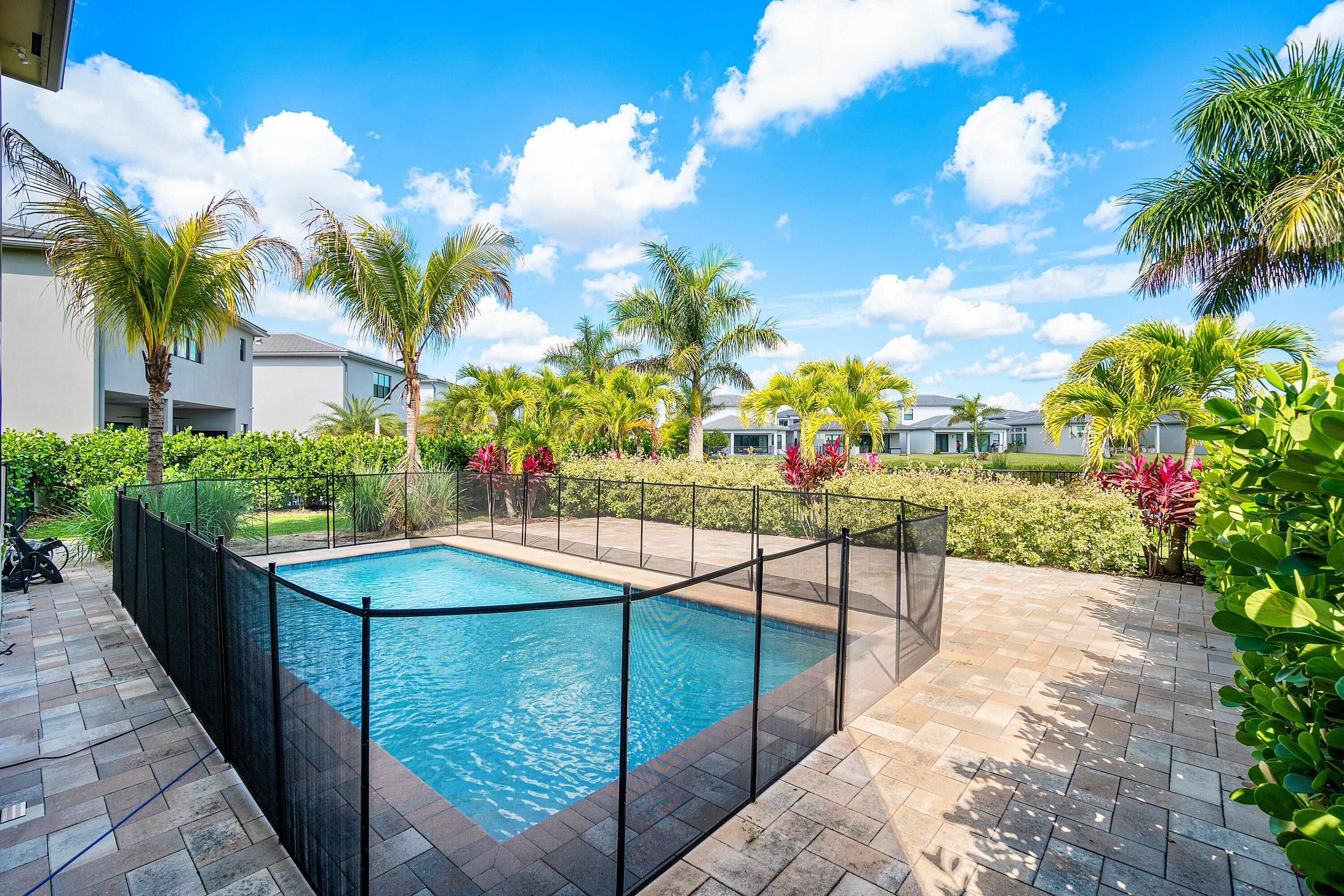 8233 Crystal Downs Avenue Boca Raton, FL 33434 - Photo 50 of 58 a view of a backyard with plants