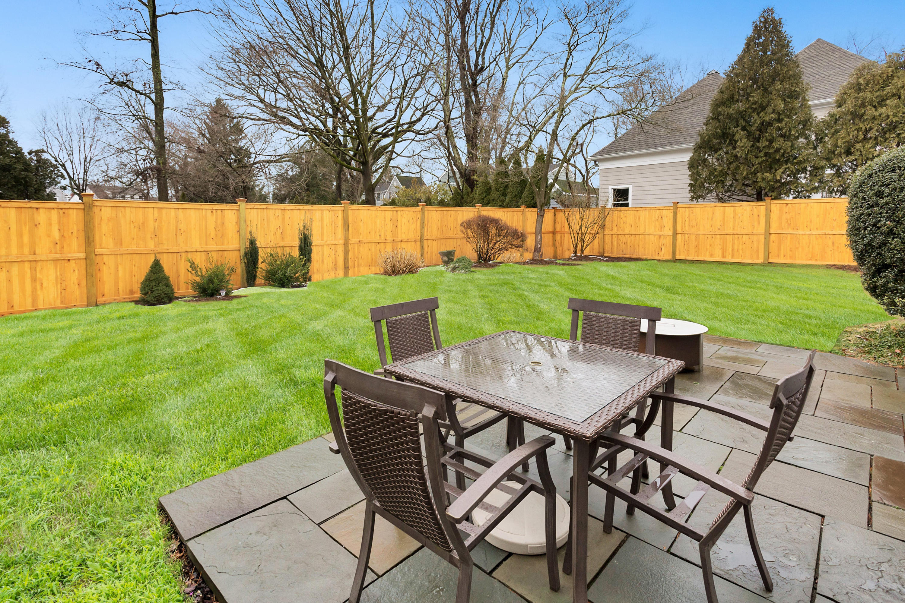 12 Dorchester Lane Riverside, CT 06878 - Photo 29 of 35 a view of yard with seating area and trees around