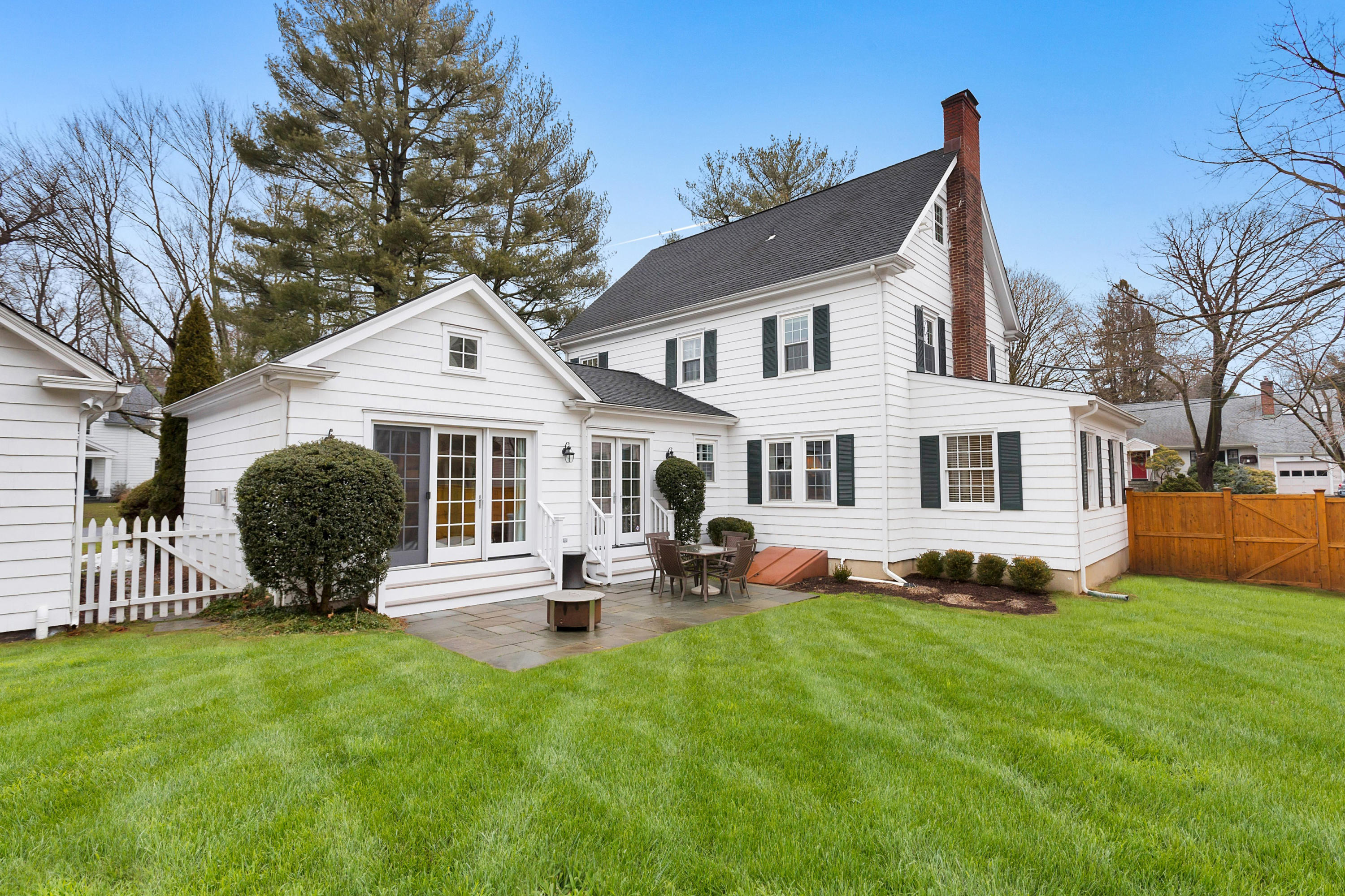 12 Dorchester Lane Riverside, CT 06878 - Photo 30 of 35 a front view of a house with a yard