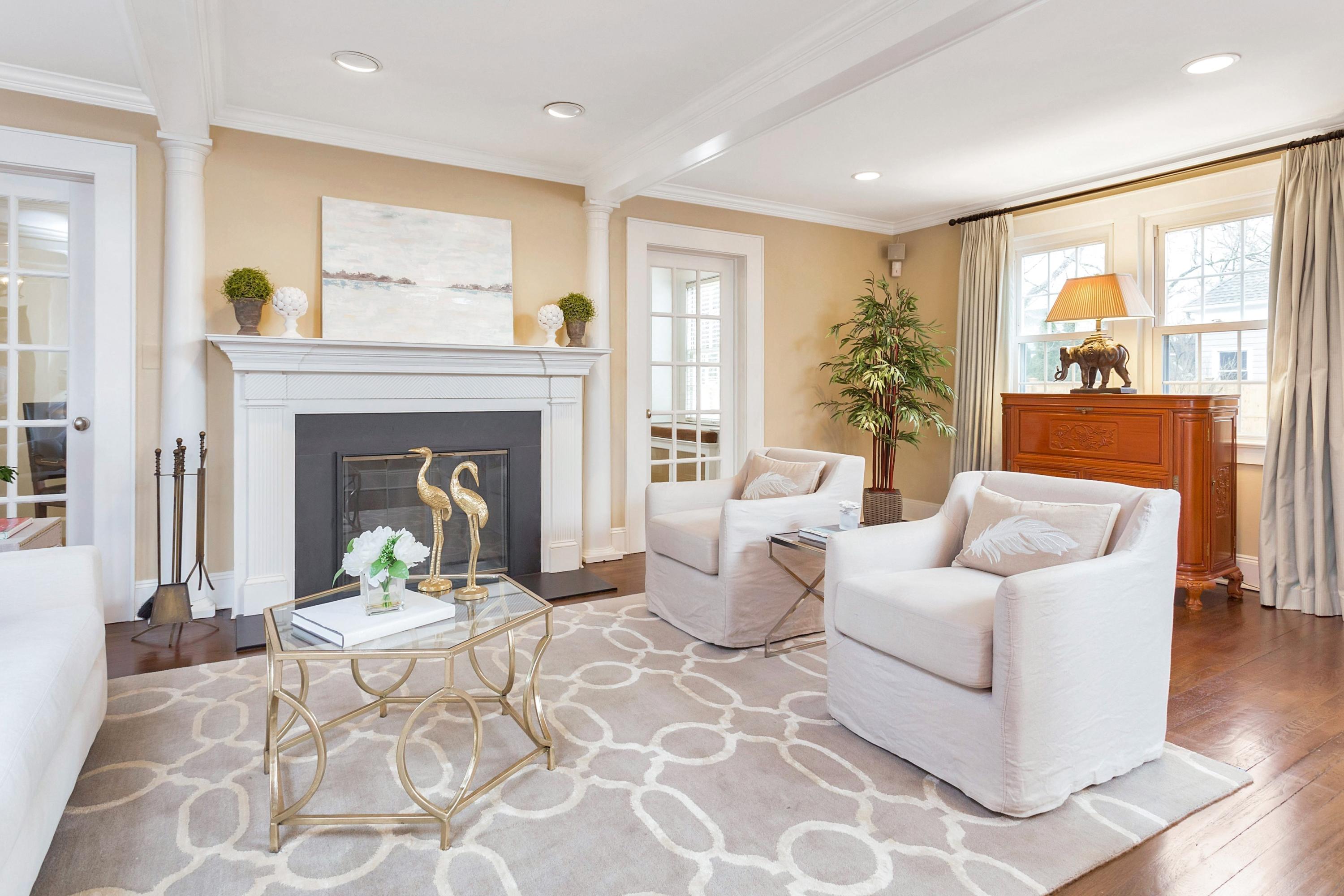 12 Dorchester Lane Riverside, CT 06878 - Photo 4 of 35 a living room with furniture and a fireplace