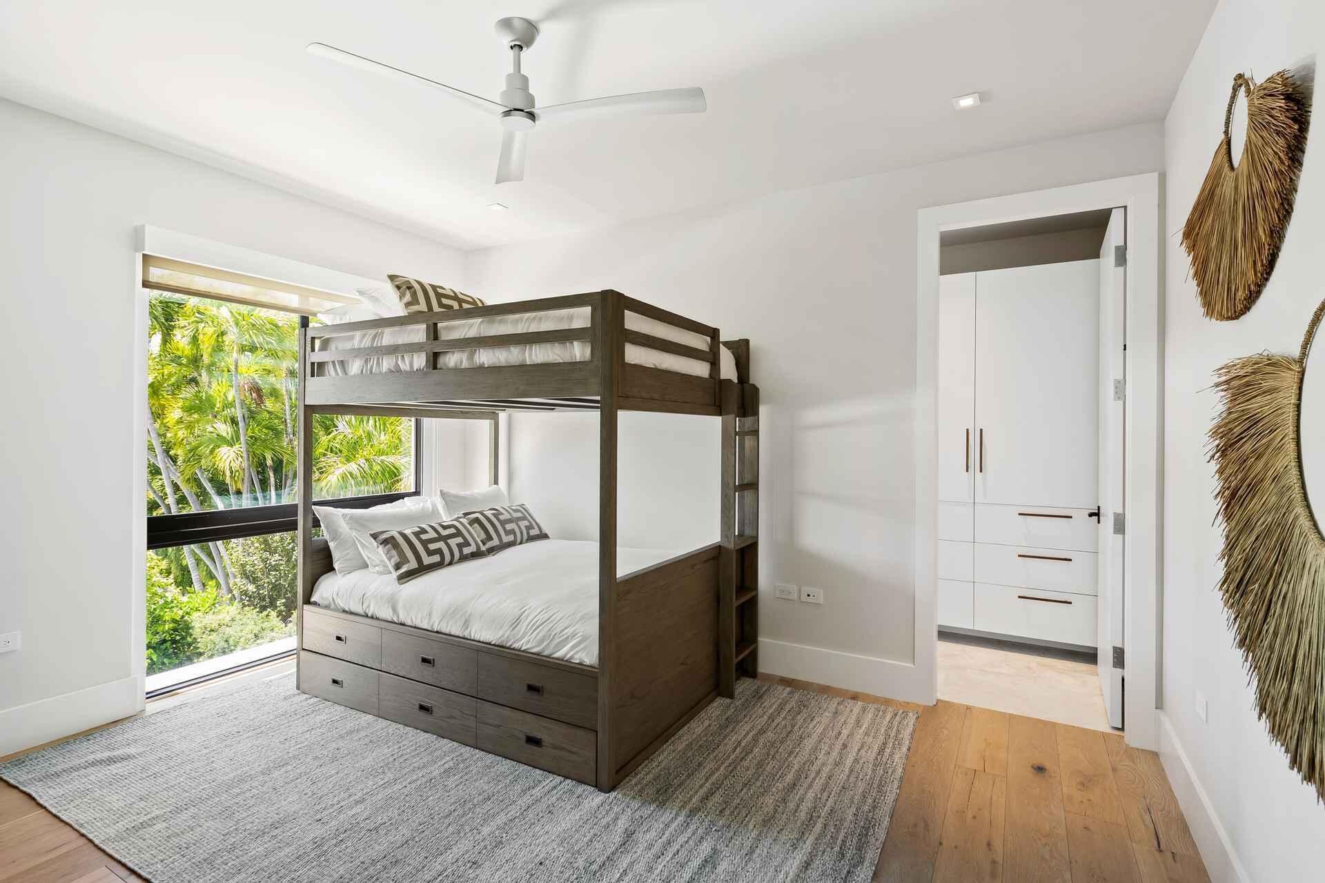 5288 Alton Road, Unit 3 Miami Beach, FL 33140 - Photo 18 of 33 a bedroom with furniture and a window