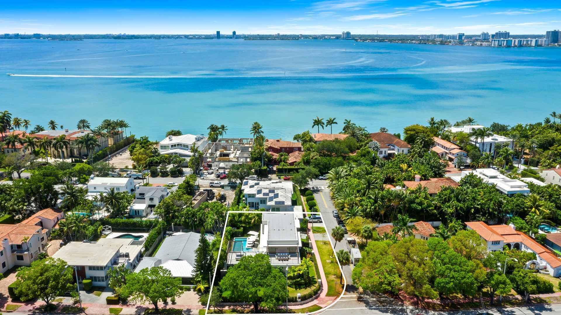 5288 Alton Road, Unit 3 Miami Beach, FL 33140 - Photo 5 of 33 a view of a lake with a building in the back