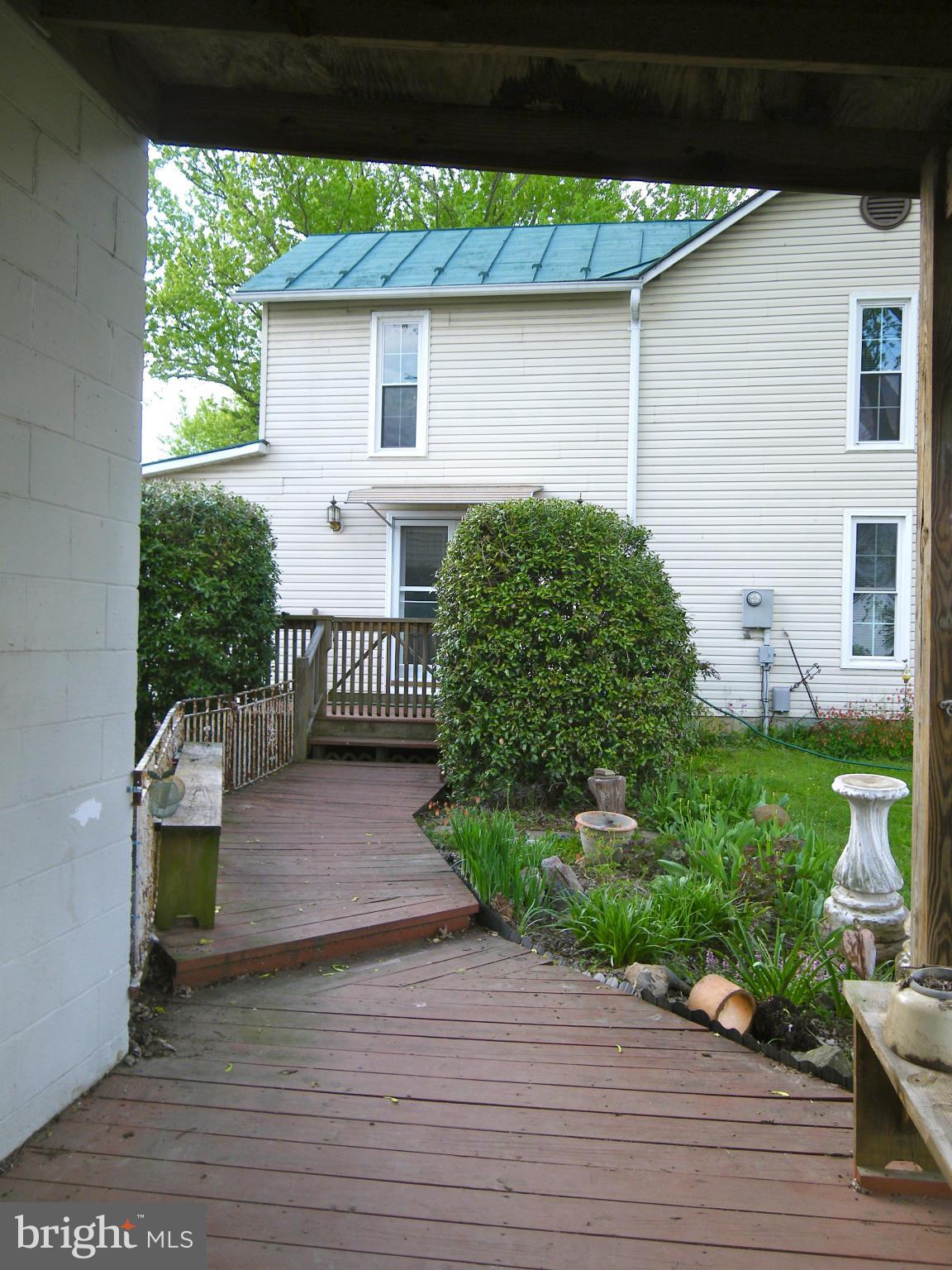 9262 Elk Run Road Catlett, VA 20119 - Photo 2 of 30 Decking Sidewalk to Deck from 2-Car Garage