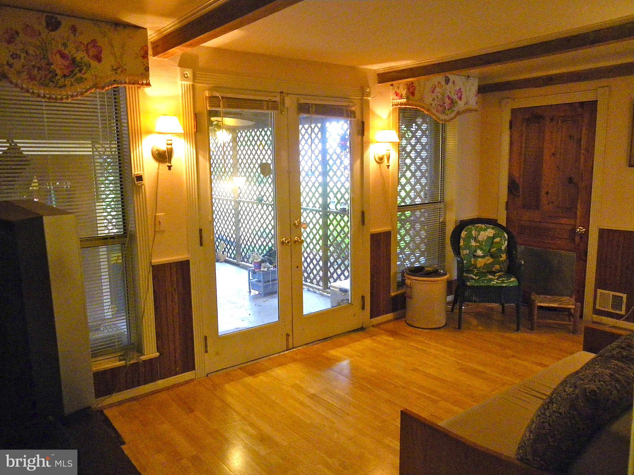 9262 Elk Run Road Catlett, VA 20119 - Photo 16 of 30 Family Room with Wood Beams & French Doors