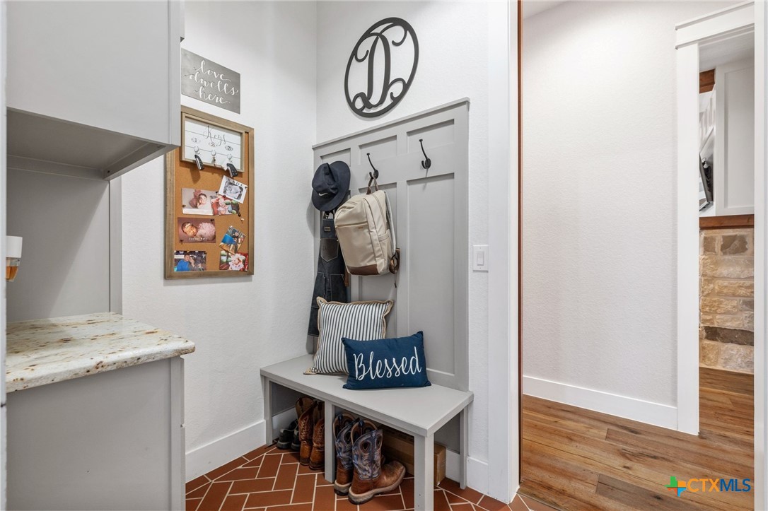 1665 Sunflower Trail Luling, TX 78648 - Photo 35 of 46 a view of hallway with bathroom