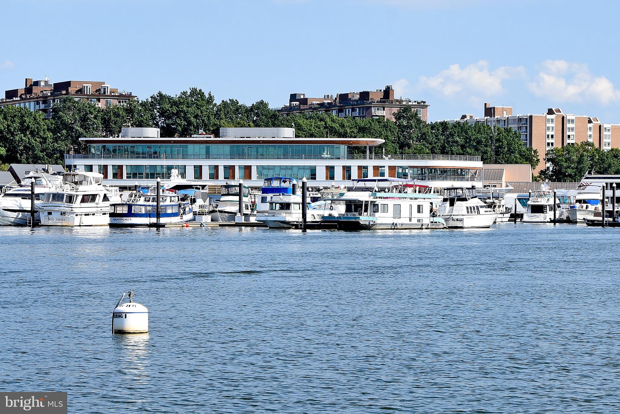 700 7th Street Southwest, Unit 826 Washington, DC 20024 - Photo 45 of 49 Serene marina with modern waterfront views.
