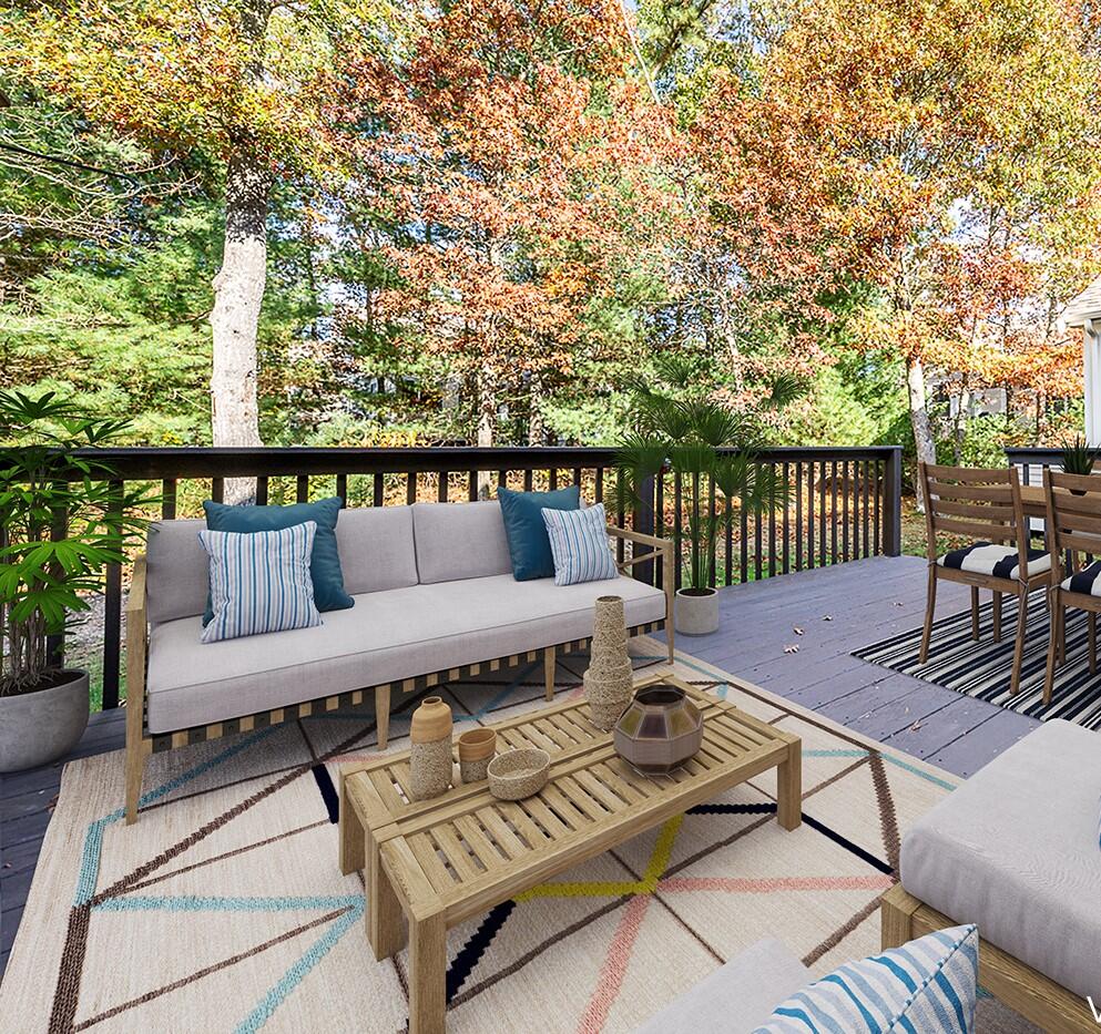 14 Chadwick Court Mashpee, MA 02649 - Photo 11 of 31 a balcony with wooden floor and outdoor seating