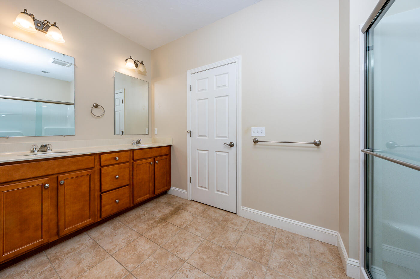 14 Chadwick Court Mashpee, MA 02649 - Photo 16 of 31 a spacious bathroom with a double vanity sink a mirror and a shower