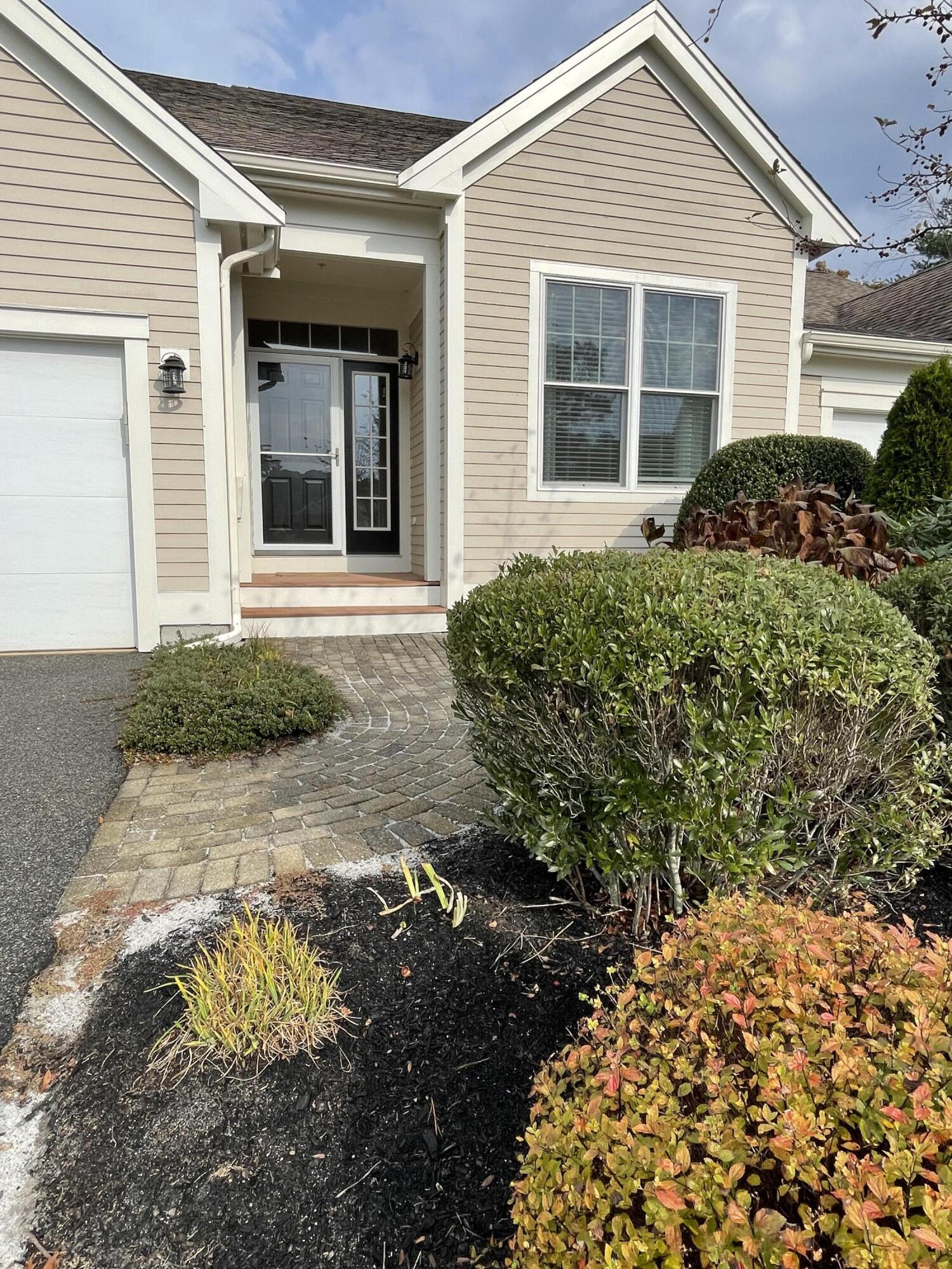 14 Chadwick Court Mashpee, MA 02649 - Photo 2 of 31 front view of a house