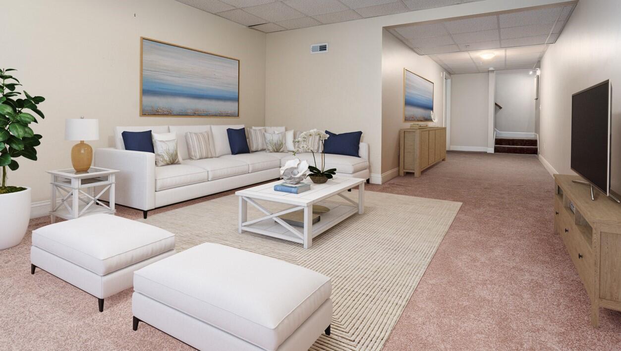 14 Chadwick Court Mashpee, MA 02649 - Photo 21 of 31 a living room with furniture and a flat screen tv