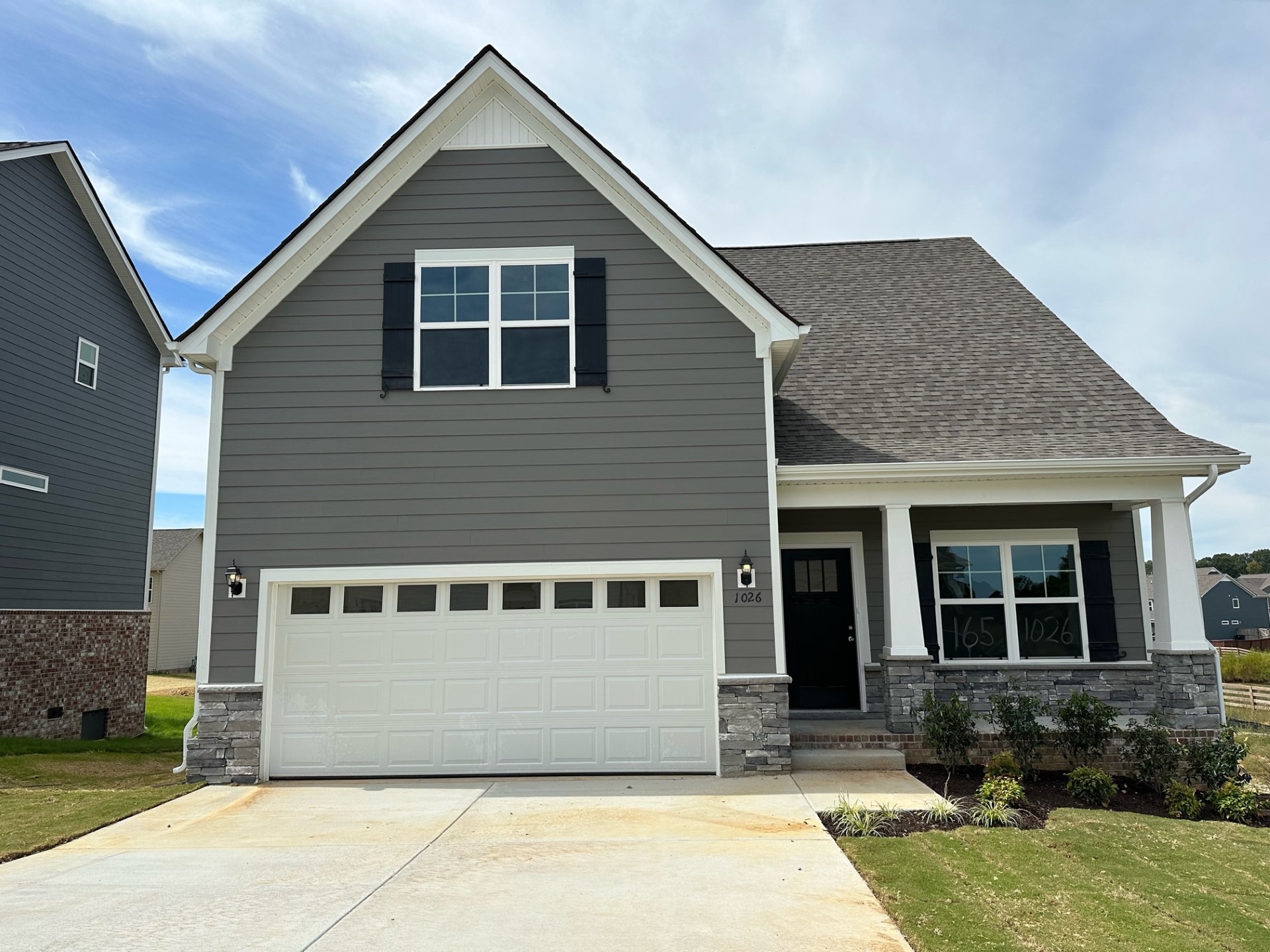 1026 Wiseman Farm Road Fairview, TN 37062 - Photo 1 of 7 a front view of a house with a yard