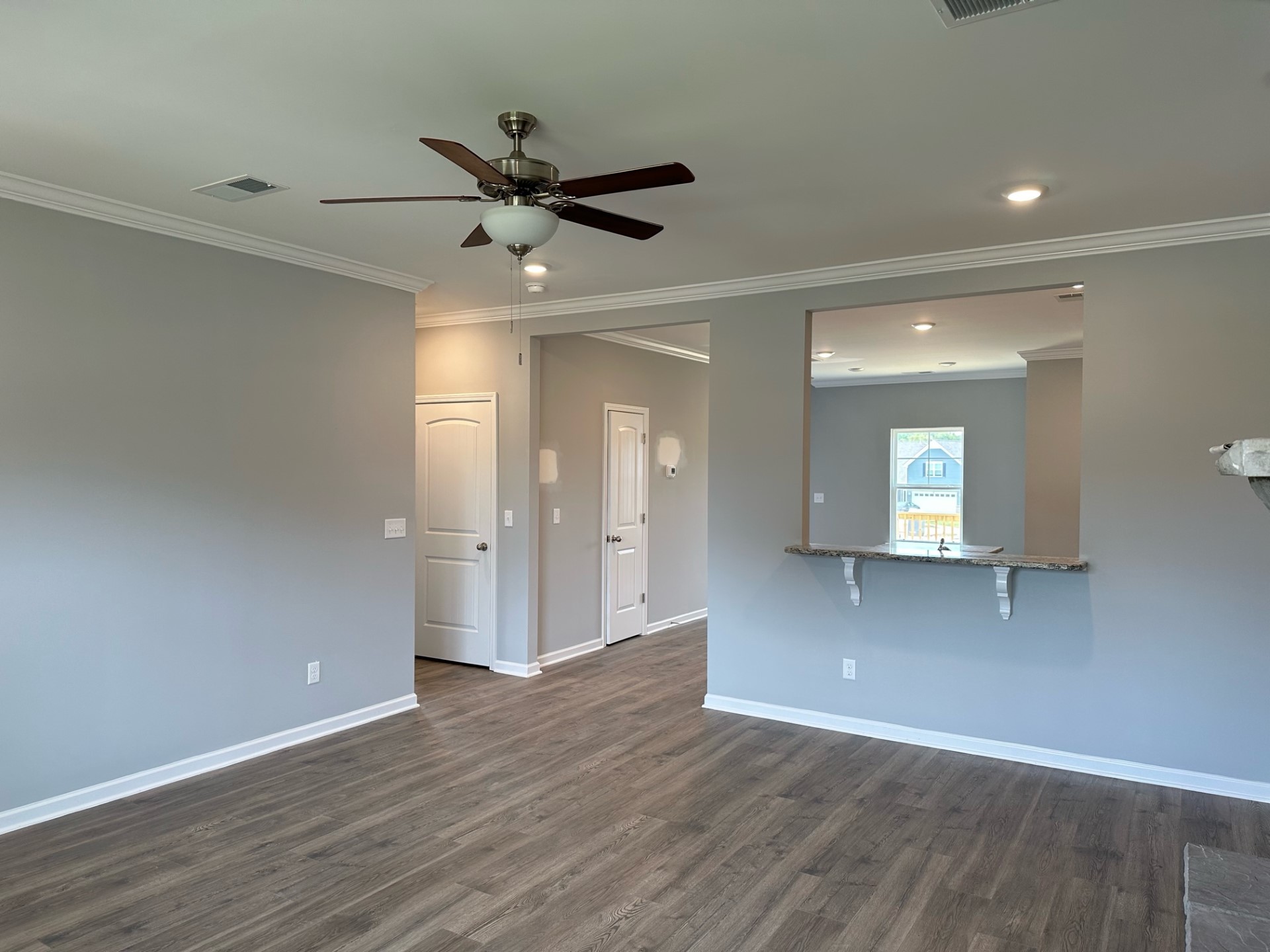 1026 Wiseman Farm Road Fairview, TN 37062 - Photo 3 of 7 a view of a big room with wooden floor and windows