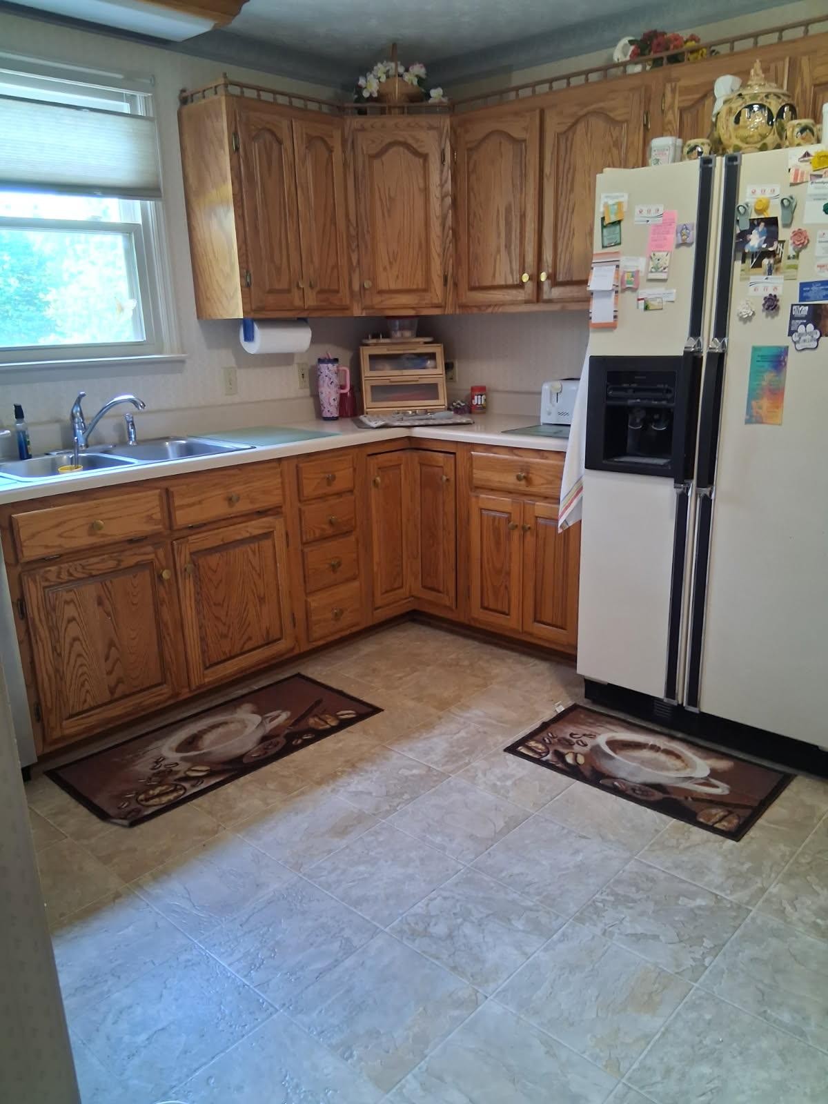 3168 Maxey Road Cedar Hill, TN 37032 - Photo 27 of 40 a kitchen with stainless steel appliances a refrigerator sink and cabinets