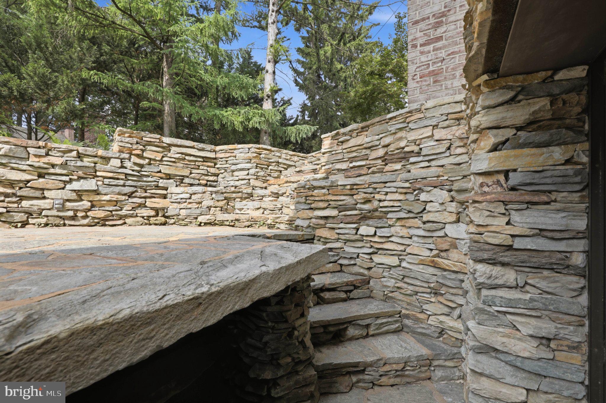 1300 Newton Road Lancaster, PA 17603 - Photo 55 of 68 Serene stone pathway in nature's embrace.