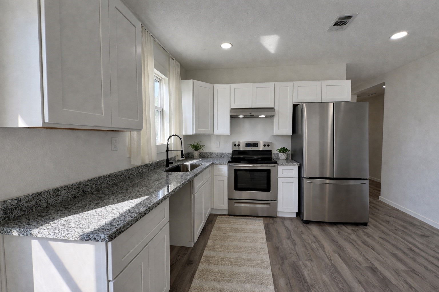 301 East 3rd Street Sweeny, TX 77480 - Photo 3 of 18 Kitchen includes fridge
Virtually staged to show potential