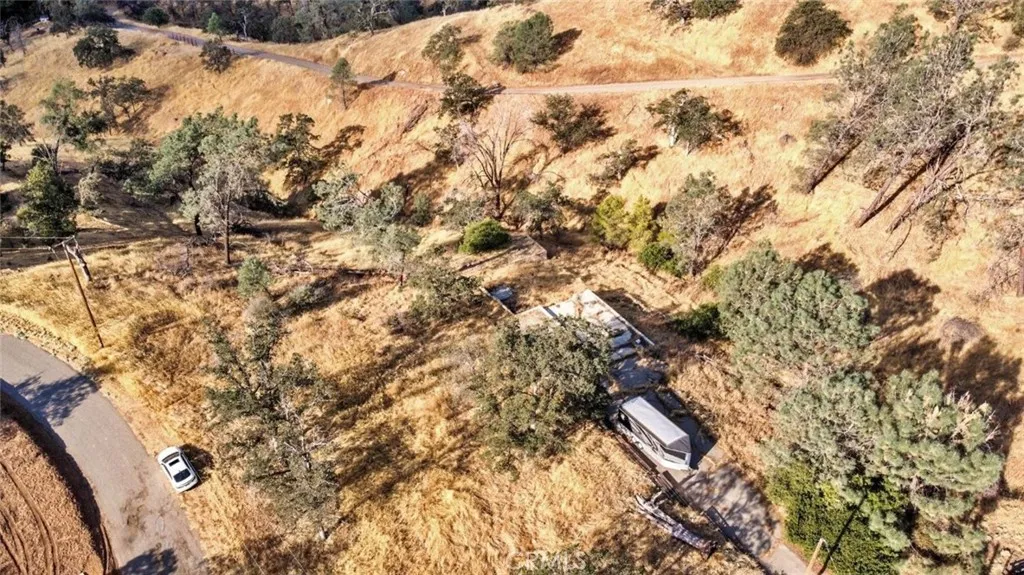 9999 Balboa Court Friant, CA 93626 - Photo 7 of 9 a view of outdoor space with wooden fence
