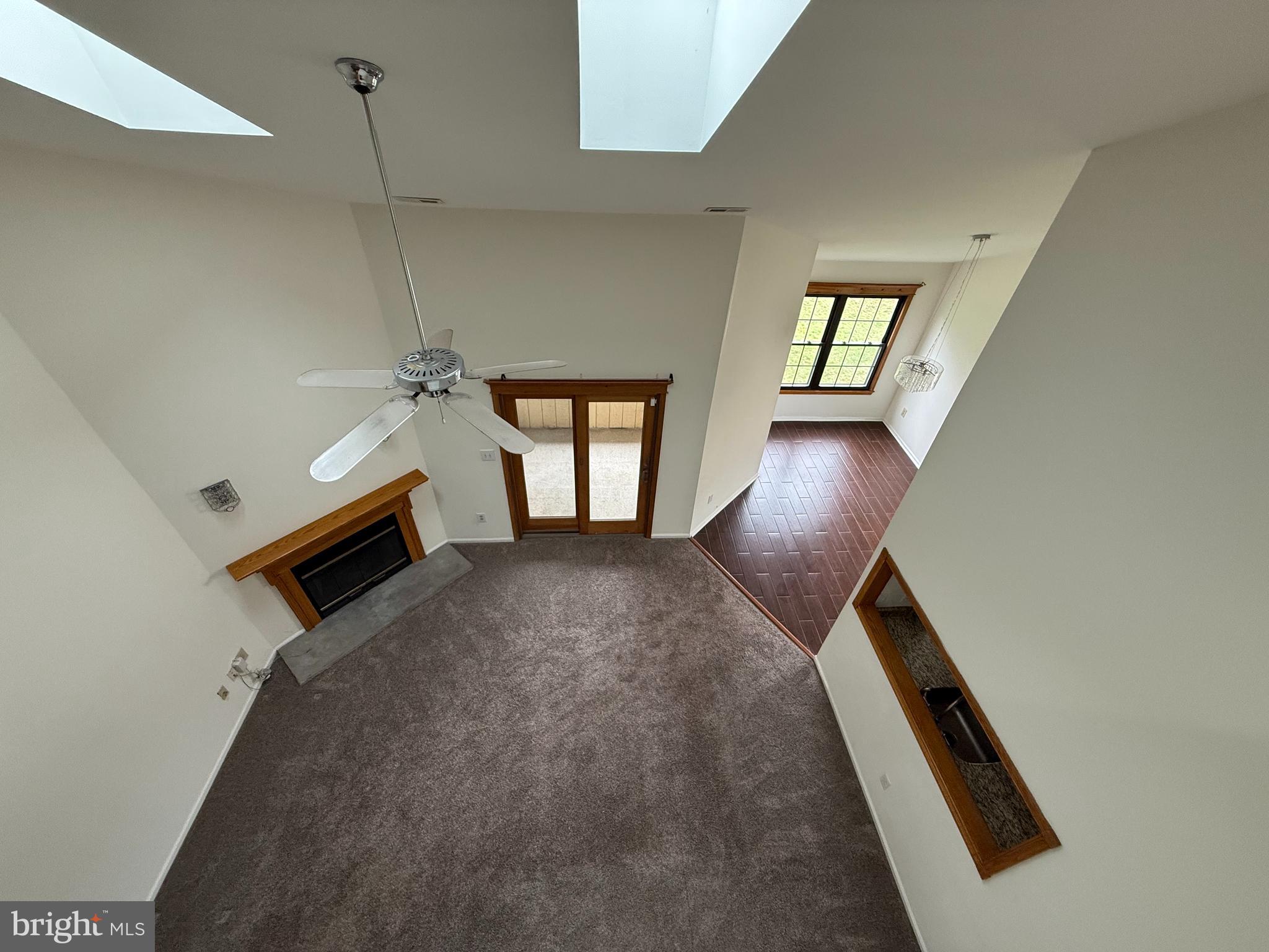 339 Georgia Court Sewell, NJ 08080 - Photo 1 of 12 wooden floor and windows in an empty room