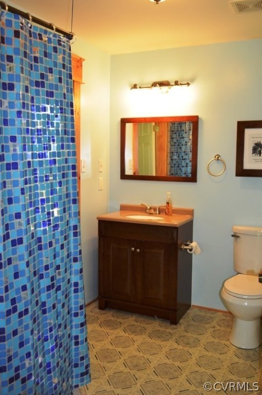 17216 Hamilton Arms Road Dewitt, VA 23840 - Photo 21 of 24 a bathroom with a sink and a toilet