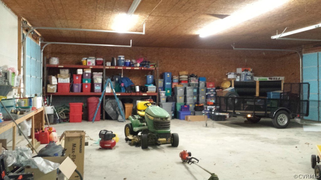 17216 Hamilton Arms Road Dewitt, VA 23840 - Photo 24 of 24 a room with lots of different colored cloths