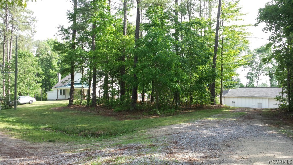 17216 Hamilton Arms Road Dewitt, VA 23840 - Photo 4 of 24 a view of a park with large trees