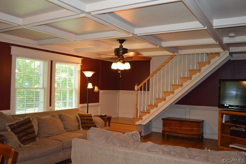 17216 Hamilton Arms Road Dewitt, VA 23840 - Photo 8 of 24 a living room with furniture ceiling fan and a window
