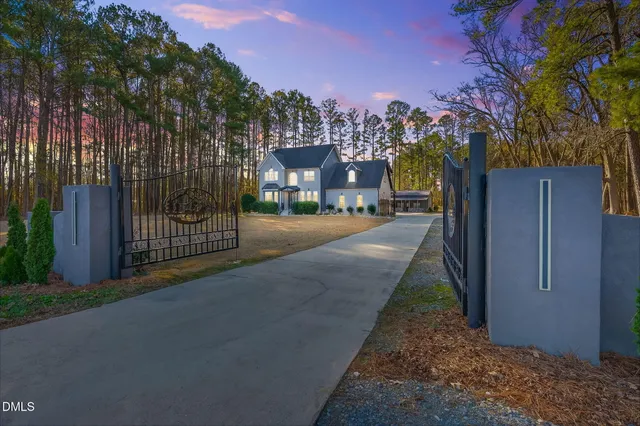 a view of a street with a building in the background