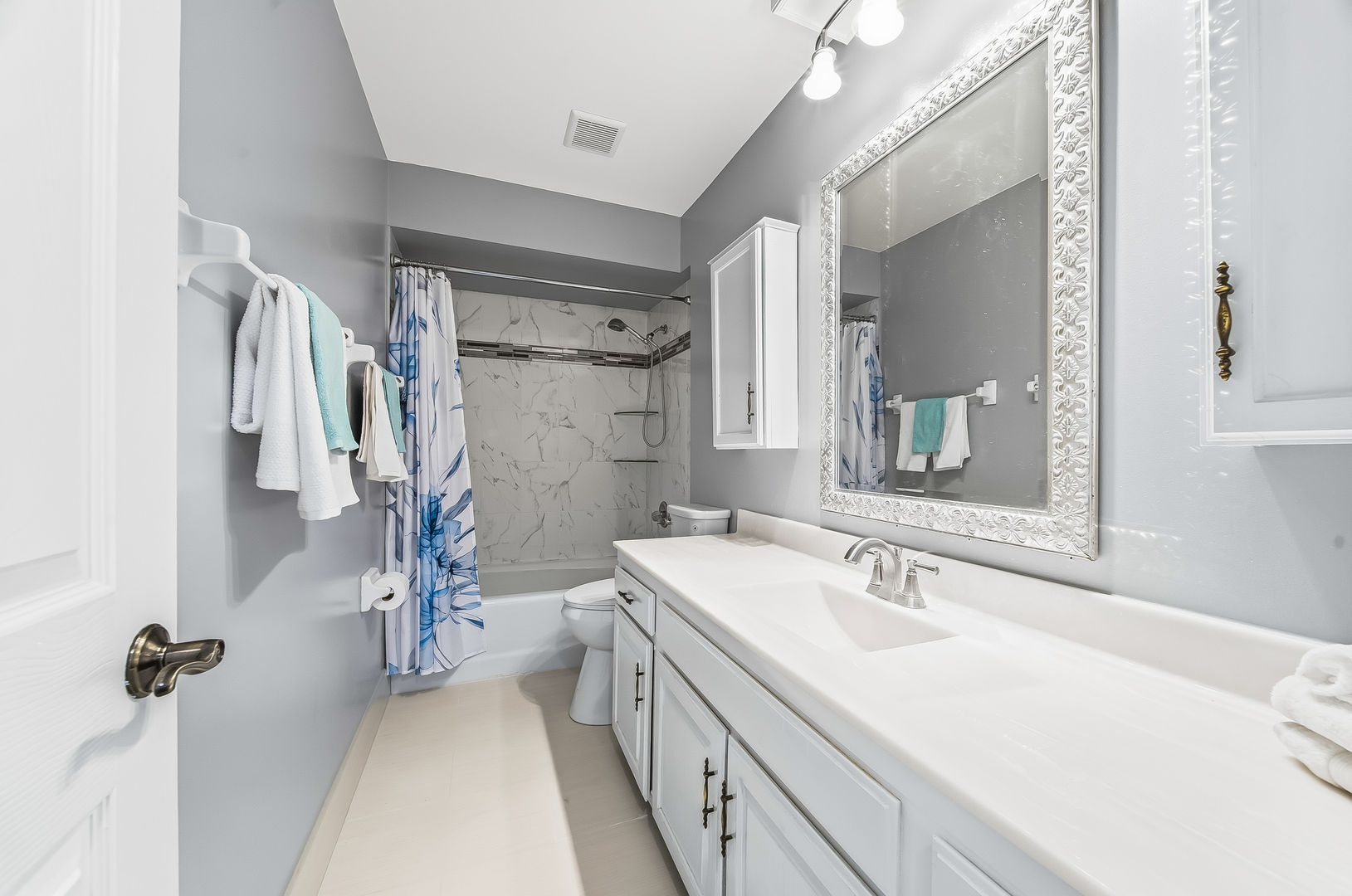 18317 Harper Street Lansing, IL 60438 - Photo 14 of 26 a bathroom with a sink double vanity and a mirror