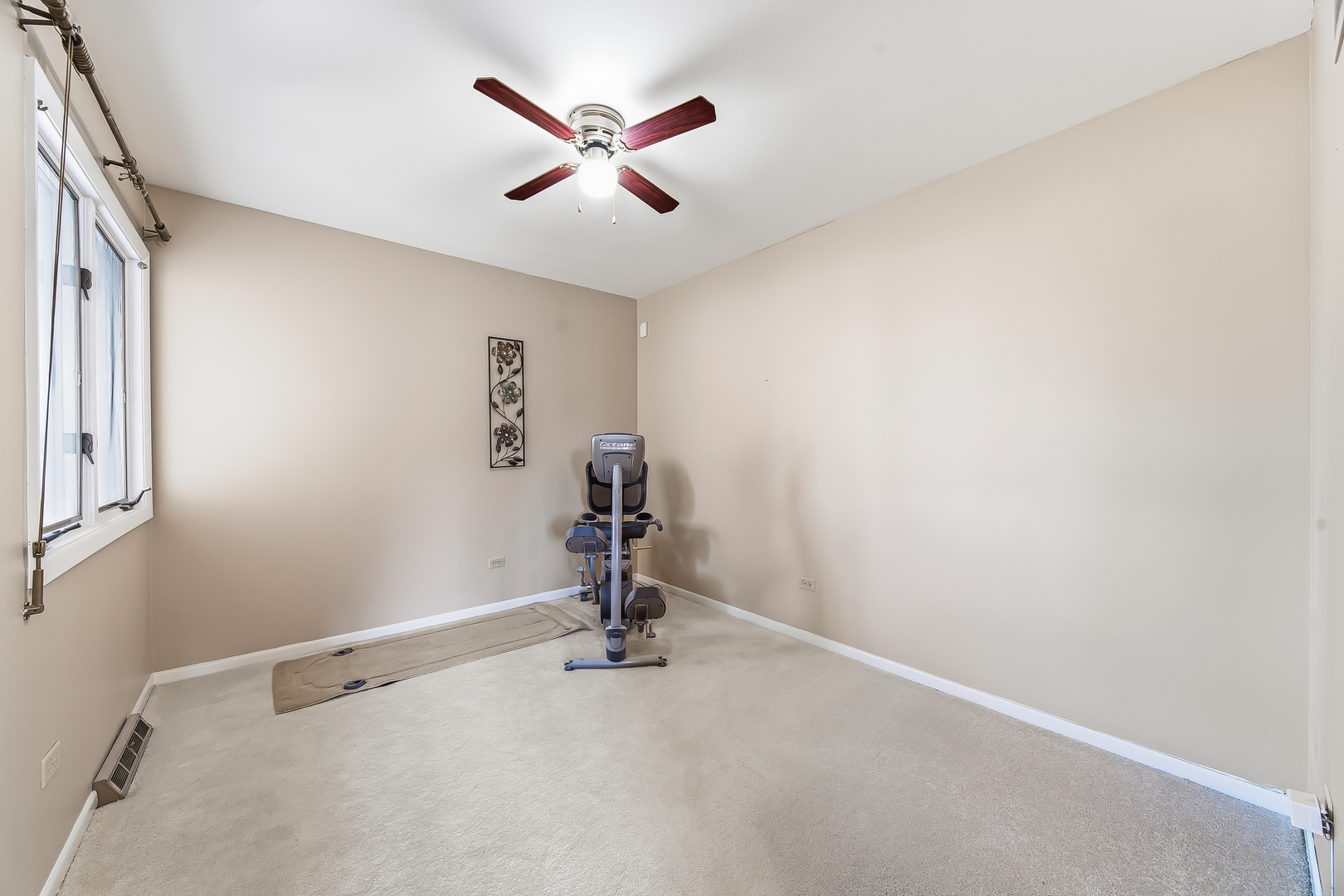 18317 Harper Street Lansing, IL 60438 - Photo 6 of 26 an empty room with a workbench