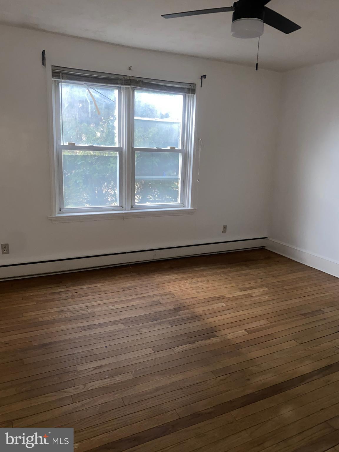 5817 Keystone Street, Unit A Philadelphia, PA 19135 - Photo 14 of 27 en empty room with window