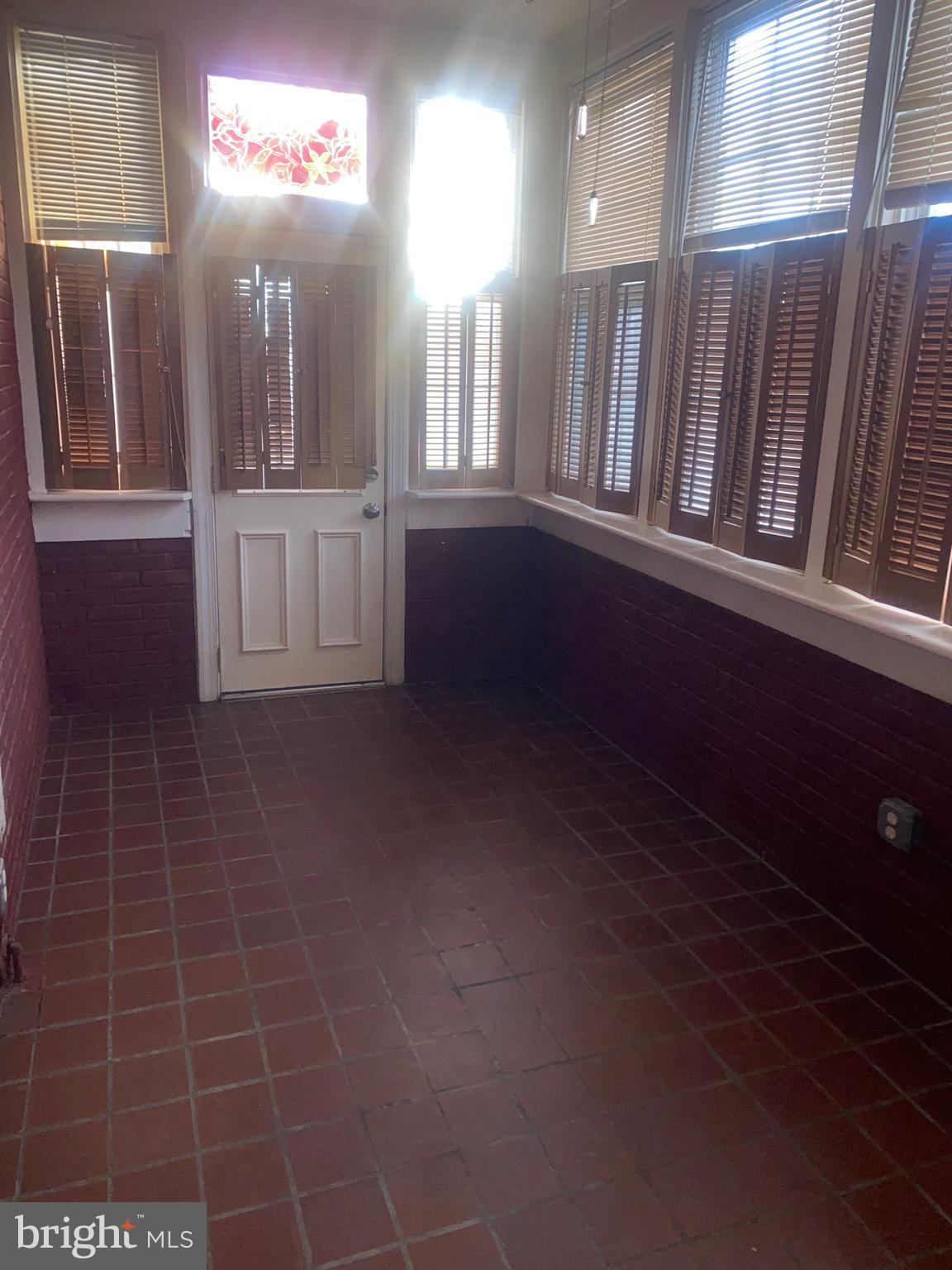 5817 Keystone Street, Unit A Philadelphia, PA 19135 - Photo 18 of 27 a view of a hallway with entryway door