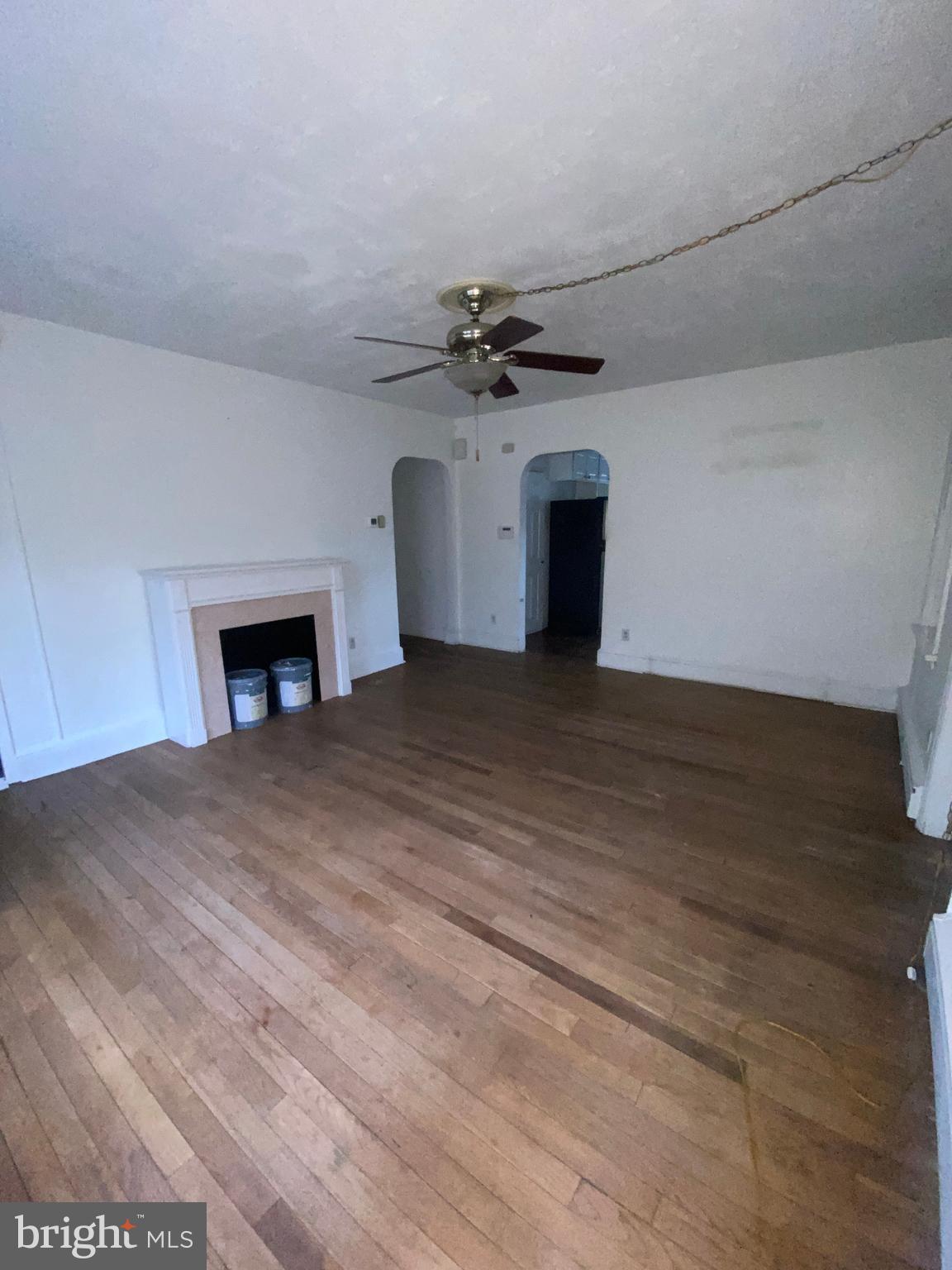 5817 Keystone Street, Unit A Philadelphia, PA 19135 - Photo 19 of 27 a view of empty room with a fireplace