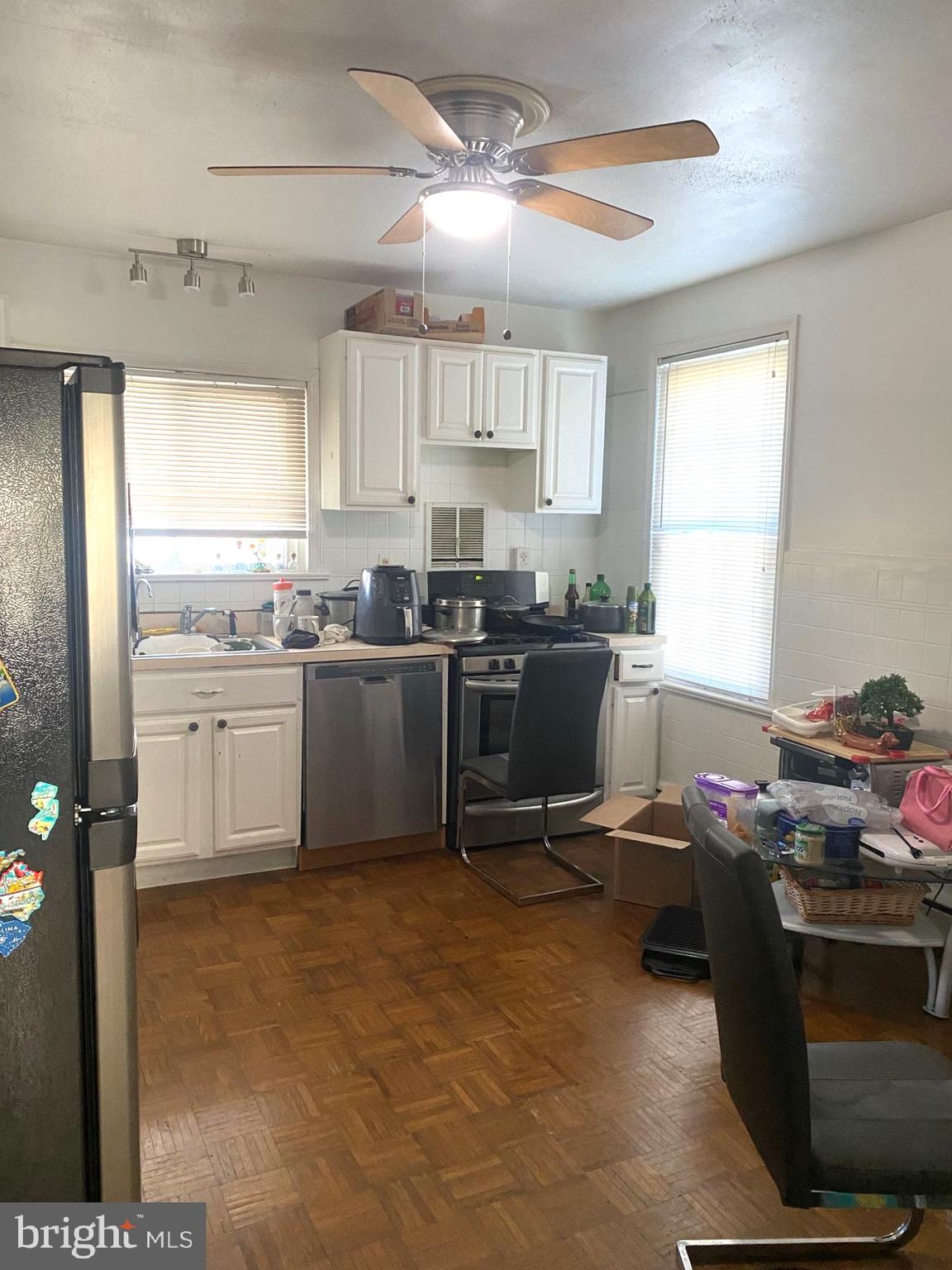 5817 Keystone Street, Unit A Philadelphia, PA 19135 - Photo 20 of 27 a kitchen with a sink stove and cabinets