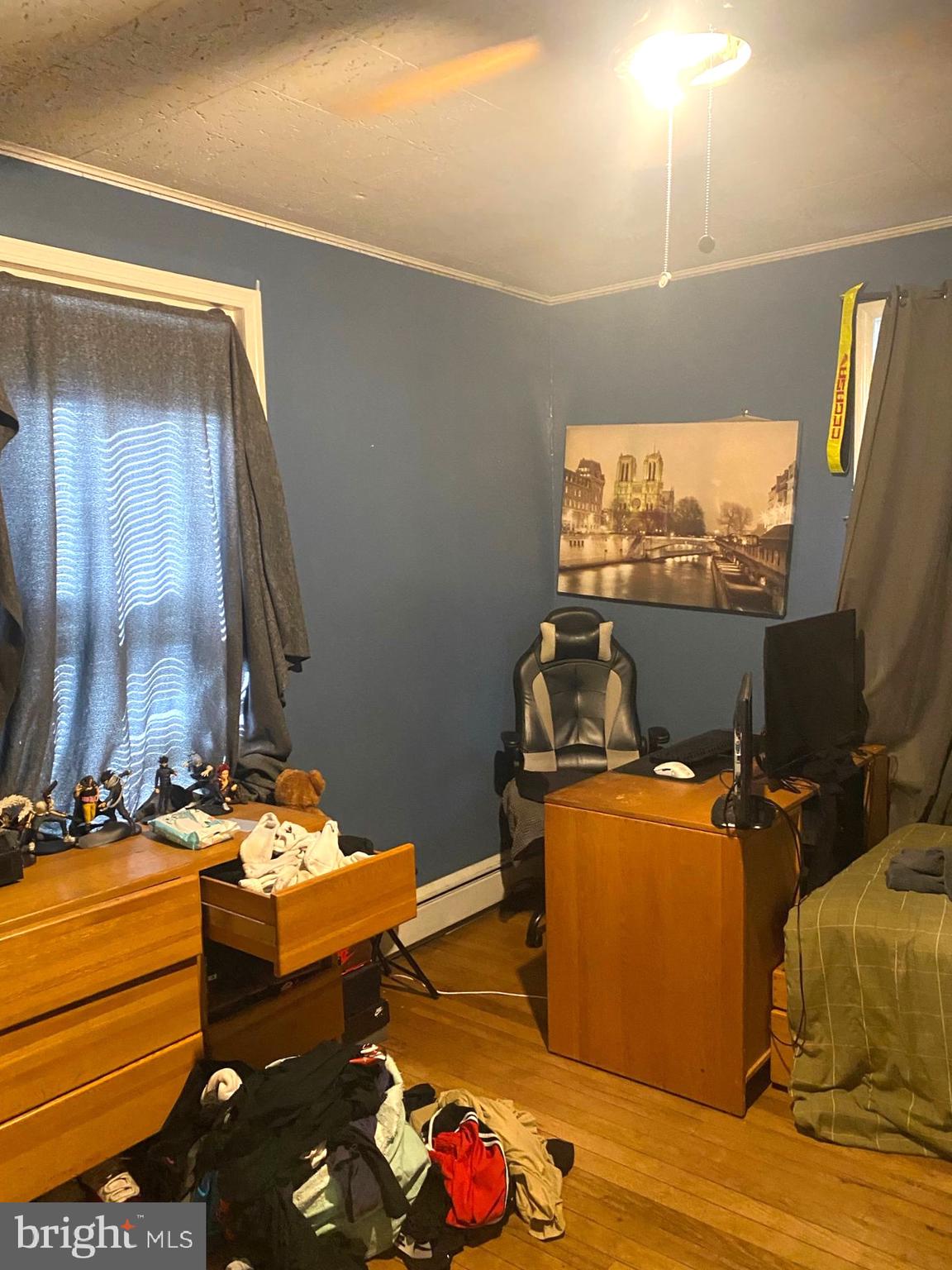 5817 Keystone Street, Unit A Philadelphia, PA 19135 - Photo 25 of 27 a room with furniture and a flat screen tv