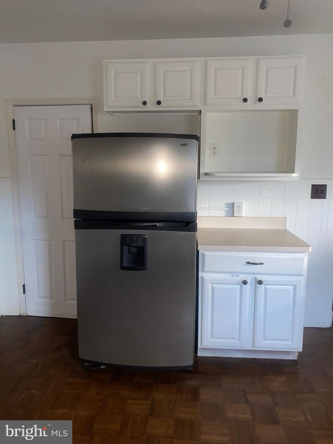 5817 Keystone Street, Unit A Philadelphia, PA 19135 - Photo 6 of 27 a view of kitchen with white cabinets
