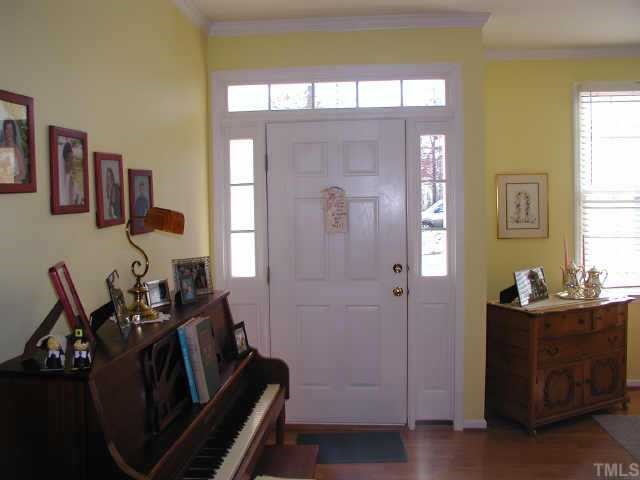 700 Neuse Ridge Drive Clayton, NC 27527 - Photo 3 of 10 a living room with furniture and a window